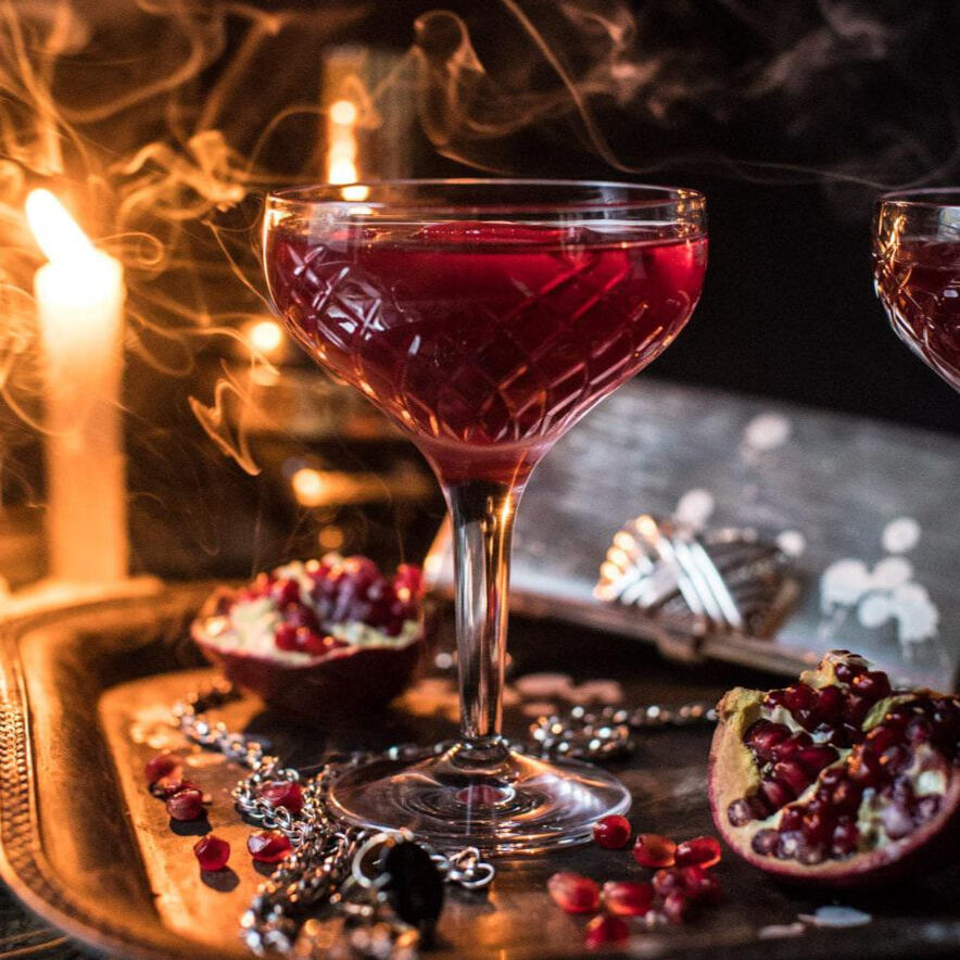 25ml triple sec 50ml cranberry juice 75ml champagne or prosecco 1 fresh bay leaf to garnish